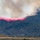 Air Tanker drops retardant on the Beckwourth Complex Fire July 9, 2021 near Frenchman Lake in N. California