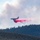 Air Tanker drops retardant on the Beckwourth Complex Fire July 9, 2021 near Frenchman Lake in N. California