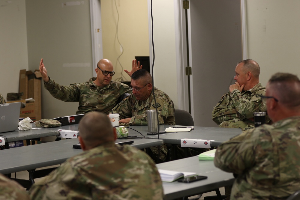 Task Force Arkansas and 39th IBCT conduct a Battle Update Brief