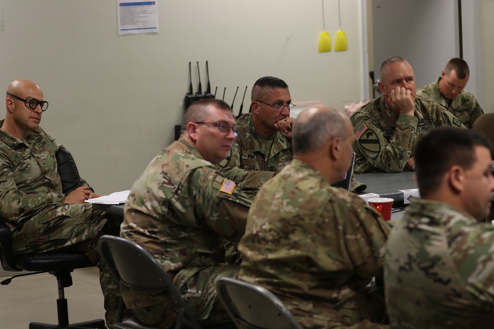 Task Force Arkansas and 39th IBCT conduct a Battle Update Brief