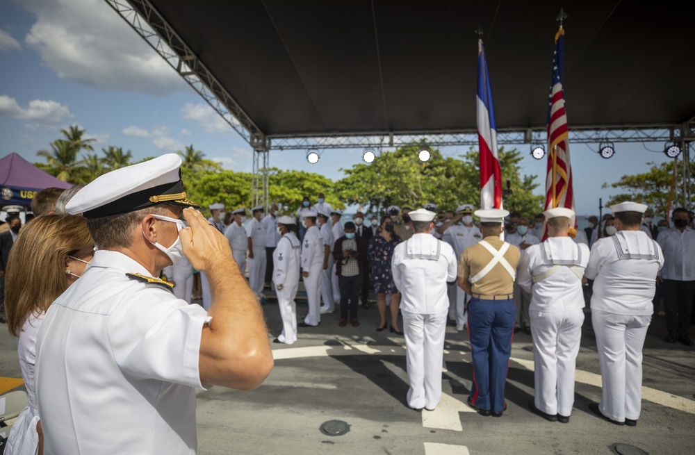 Commander of U.S. Naval Forces Southern Command/U.S. 4th Fleet Renders a Salute During the National Anthem