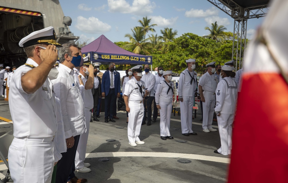 Guests Stand for the U.S. National Anthem During a Reception on USS Billings