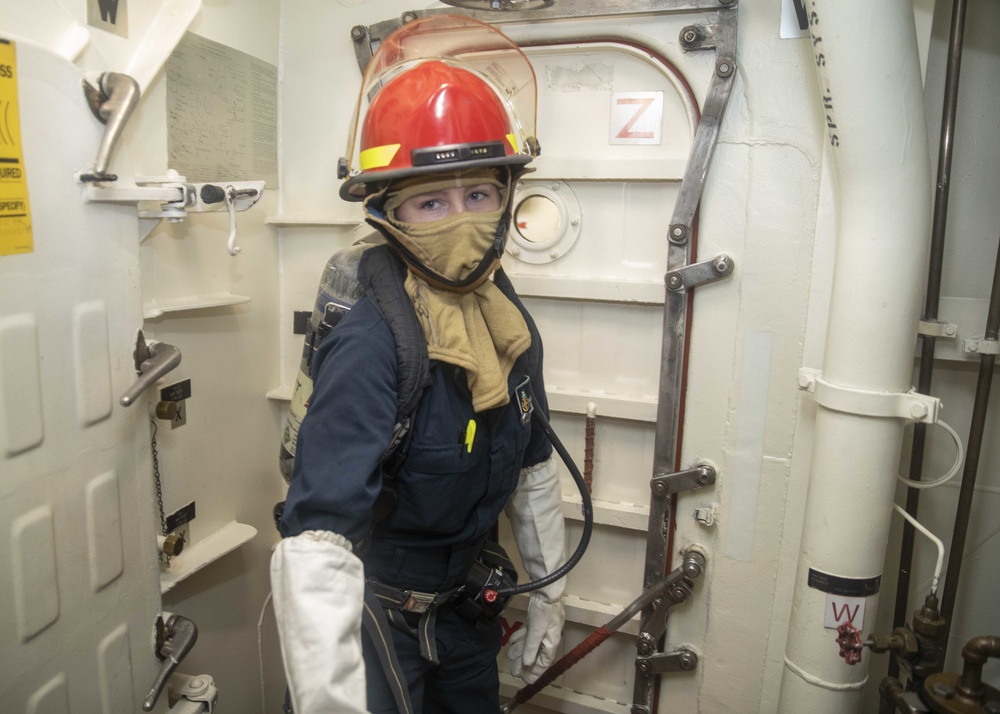 Damage Controlman Secures Passageway