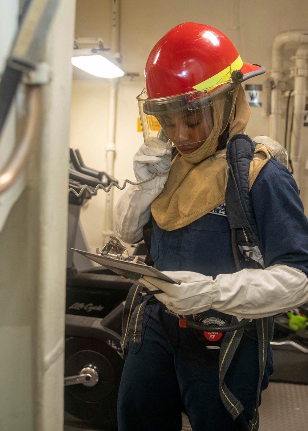 Sailor Reports Status of Simulated Fire