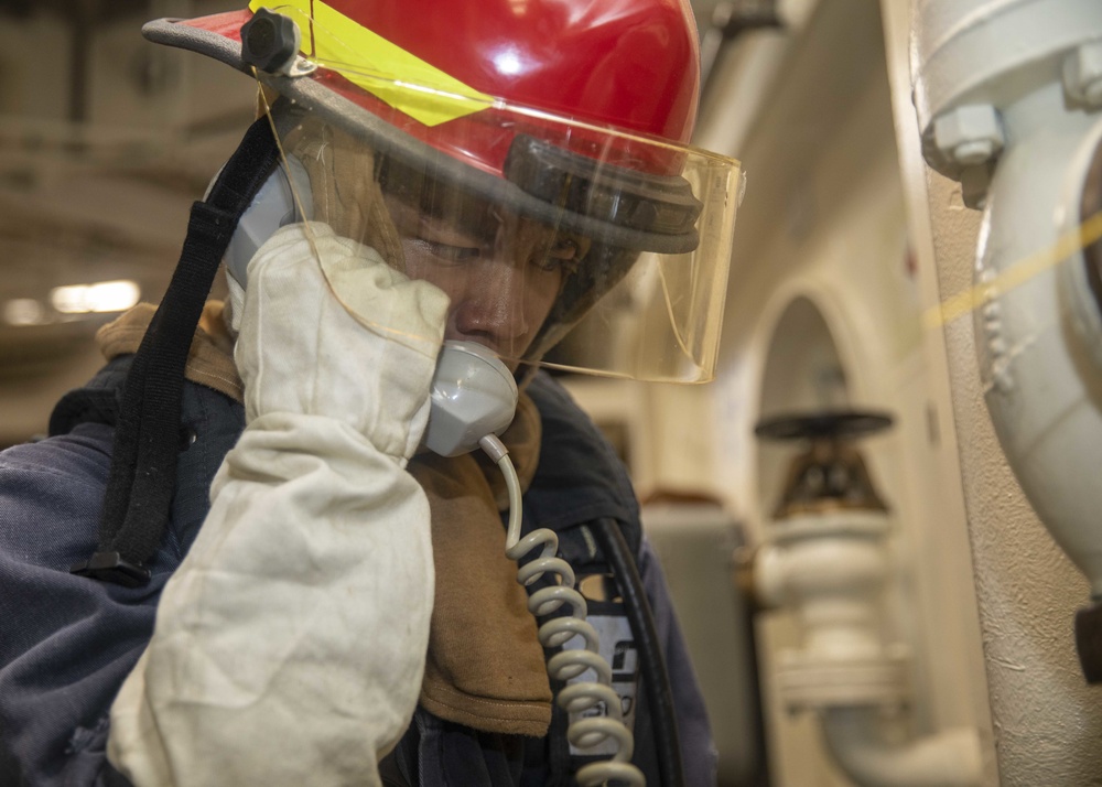 Sailor Reports Status of Simulated Fire