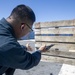 Sailor Reloads Pistol During Small Arms Familiarization Course