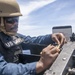 Sailor Reloads Machine Gun During Familiarization Course