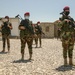 Peshmerga female soldiers run through squad movement drills