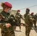 Peshmerga female soldiers run through squad movement drills