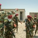 Peshmerga female soldiers run through squad movement drills