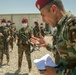 Peshmerga female soldiers run through squad movement drills