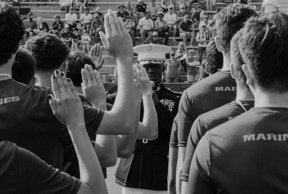 RS Orange County Future Marines participate in an oath of enlistment at San Diego Loyals game