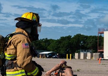 GOING IN BLIND AND LOW: 152nd CES Firefighters show off their confidence in SCBA confined space confidence course