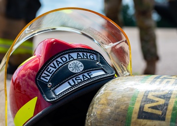 GOING IN BLIND AND LOW: 152nd CES Firefighters show off their confidence in SCBA confined space confidence course
