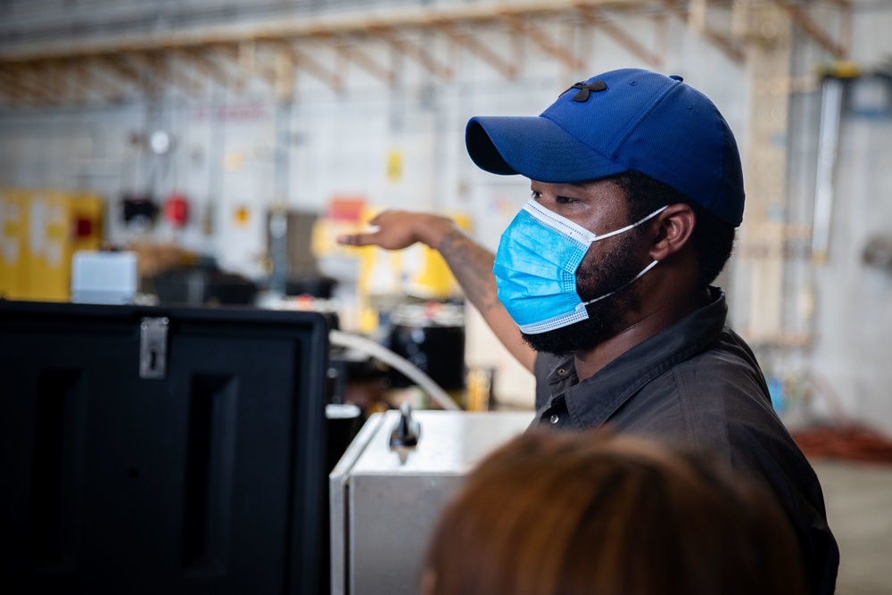 Japanese Officials Visit Marine Corps Air Station Futemna for Brief Over the Bases Wastewater Disposal Process.