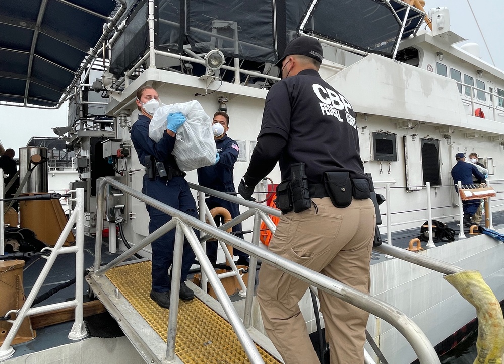 Coast Guard offloads $15 million in seized cocaine, transfers custody of 2 smugglers in San Juan, Puerto Rico