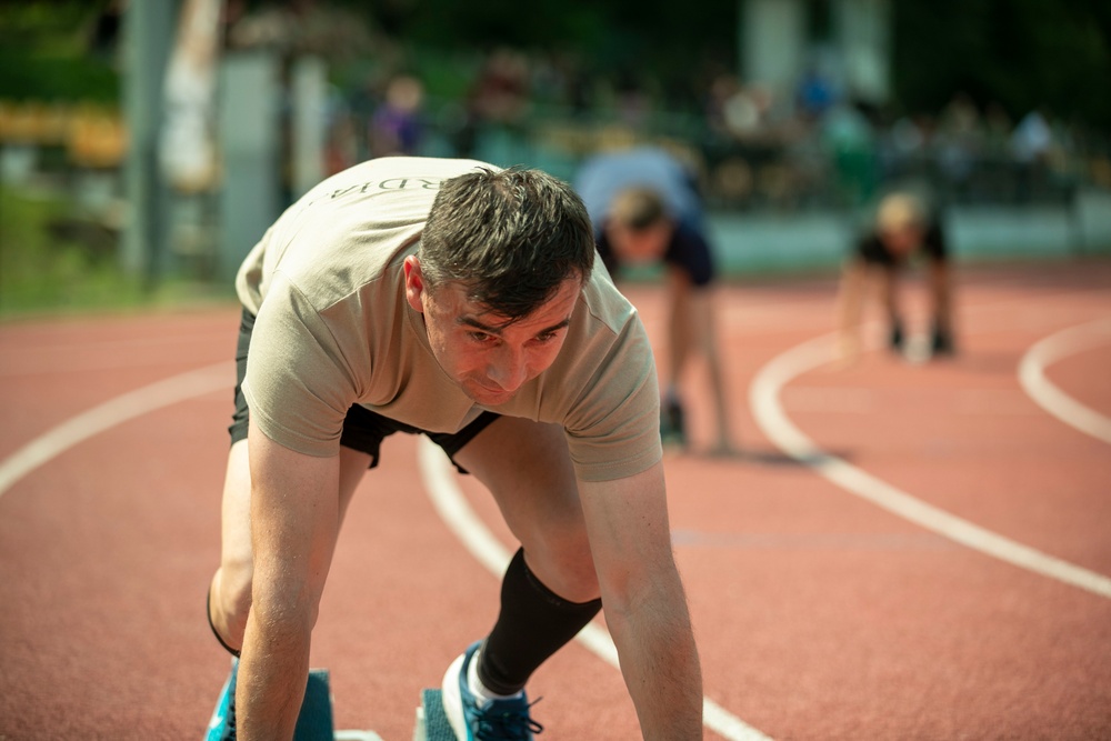 Battle Group Poland competes in track and field celebrating Polish 15th Mechanized Brigade anniversary