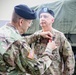 Lt. Gen. Terry R. Ferrell Presents Outgoing 1st TSC Commanding General Award