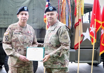Lt. Gen. Terry R. Ferrell Presents Outgoing 1st TSC Commanding General Award