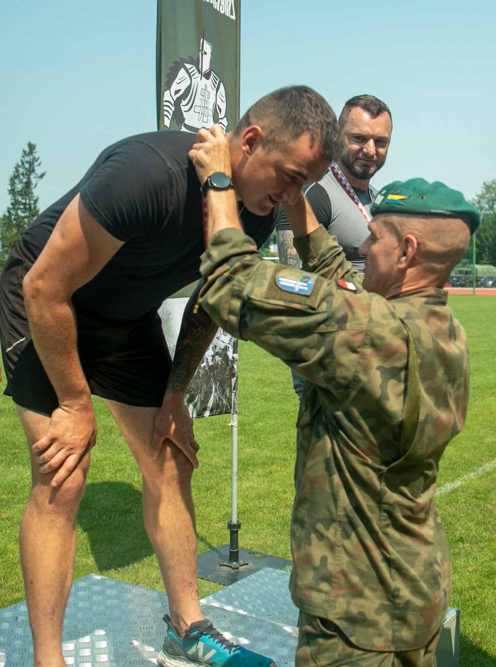 Battle Group Poland competes in track and field celebrating Polish 15th Mechanized Brigade anniversary