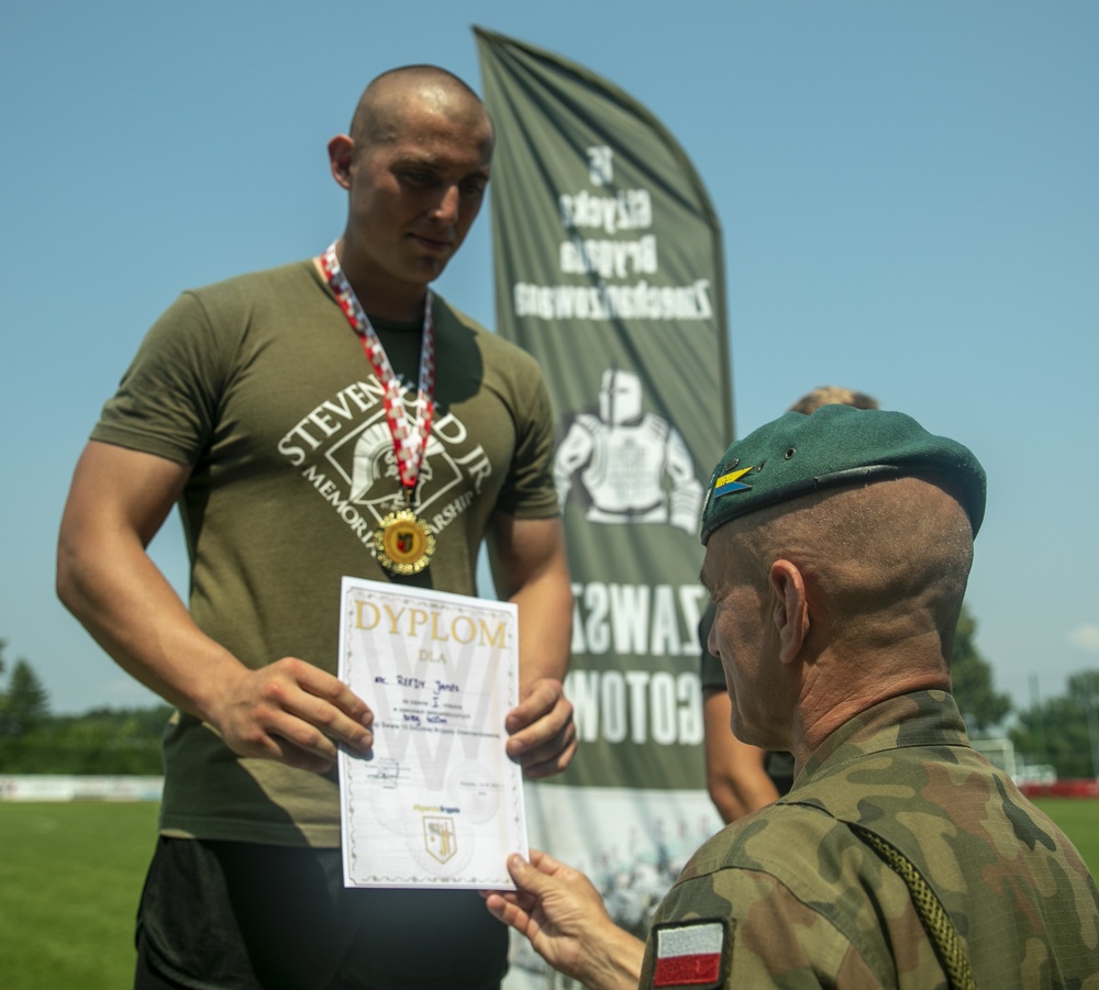 Battle Group Poland competes in track and field celebrating Polish 15th Mechanized Brigade anniversary