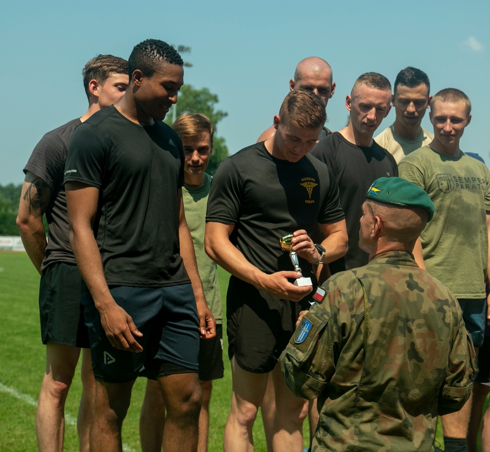 Battle Group Poland competes in track and field celebrating Polish 15th Mechanized Brigade anniversary