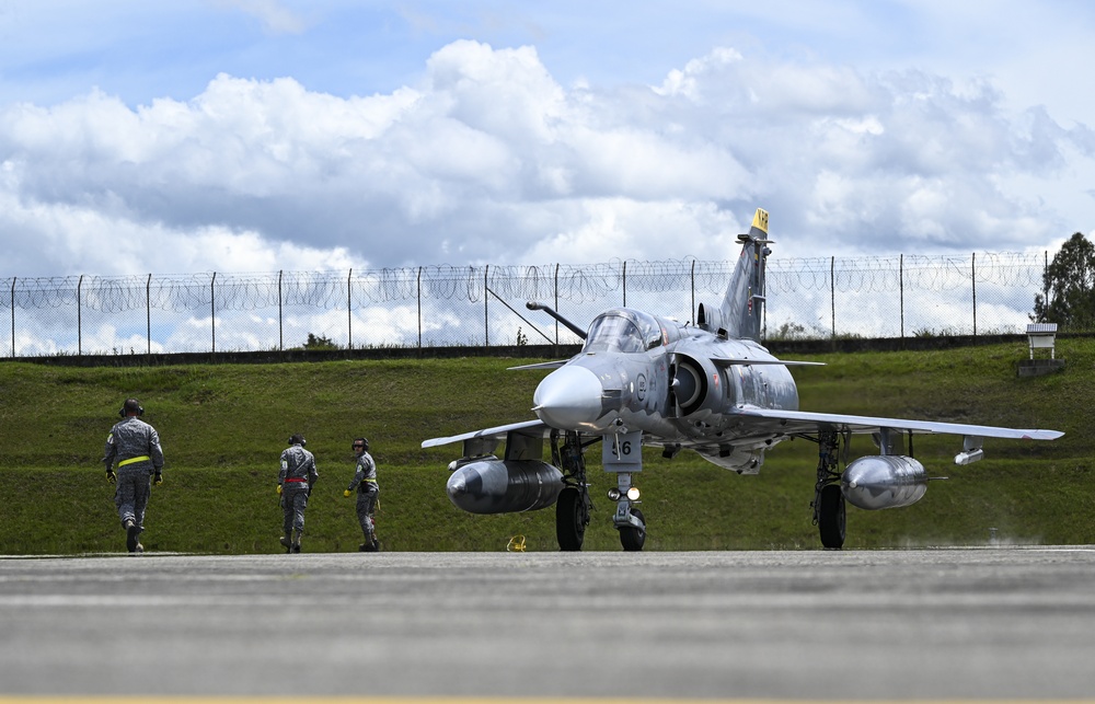 U.S. and Colombian Air Force aircraft take off during Exercise Relampago VI