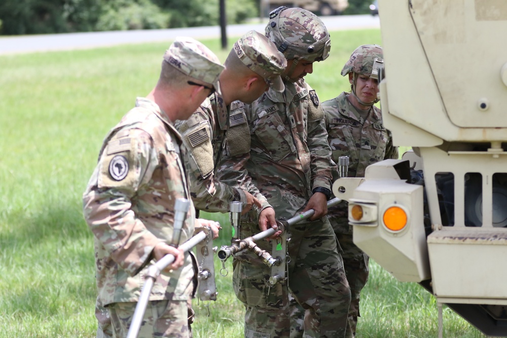 Soldiers of the 482nd Chemical Company demonstrate decontamination capabilities and perform decontamination training