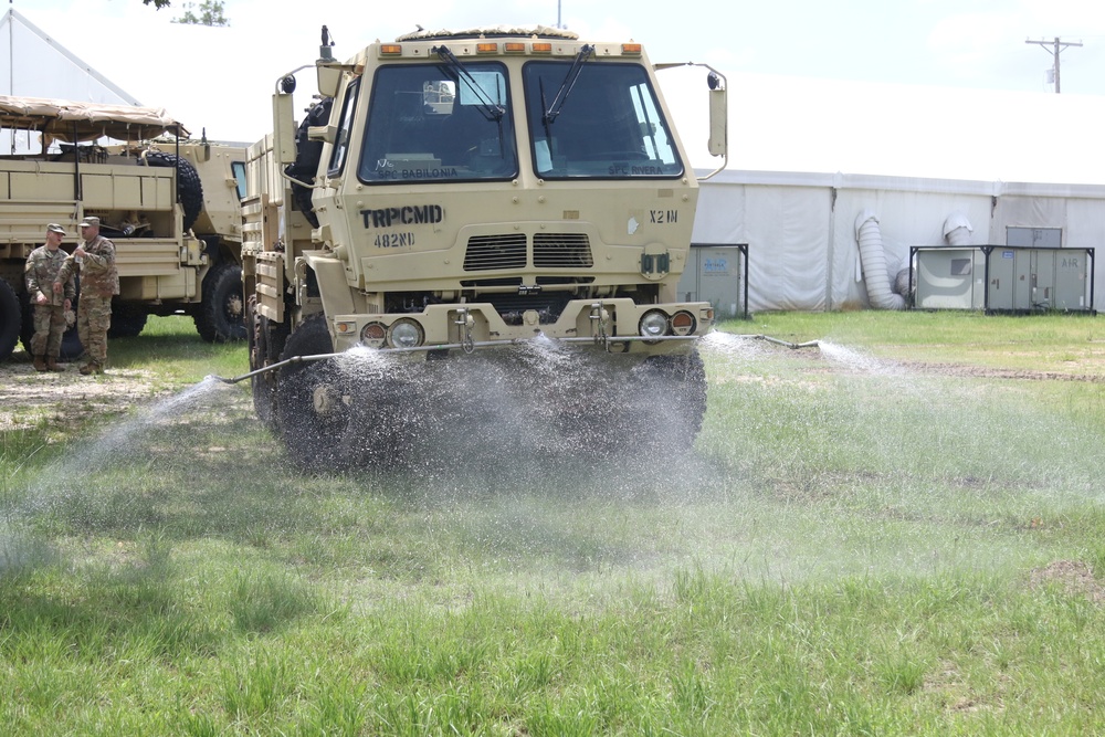 Soldiers of the 482nd Chemical Company demonstrate decontamination capabilities and perform decontamination training