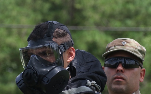 Soldiers of the 482nd Chemical Company demonstrate decontamination capabilities and perform decontamination training