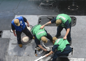 USS Springfield Departs USS Emory S. Land
