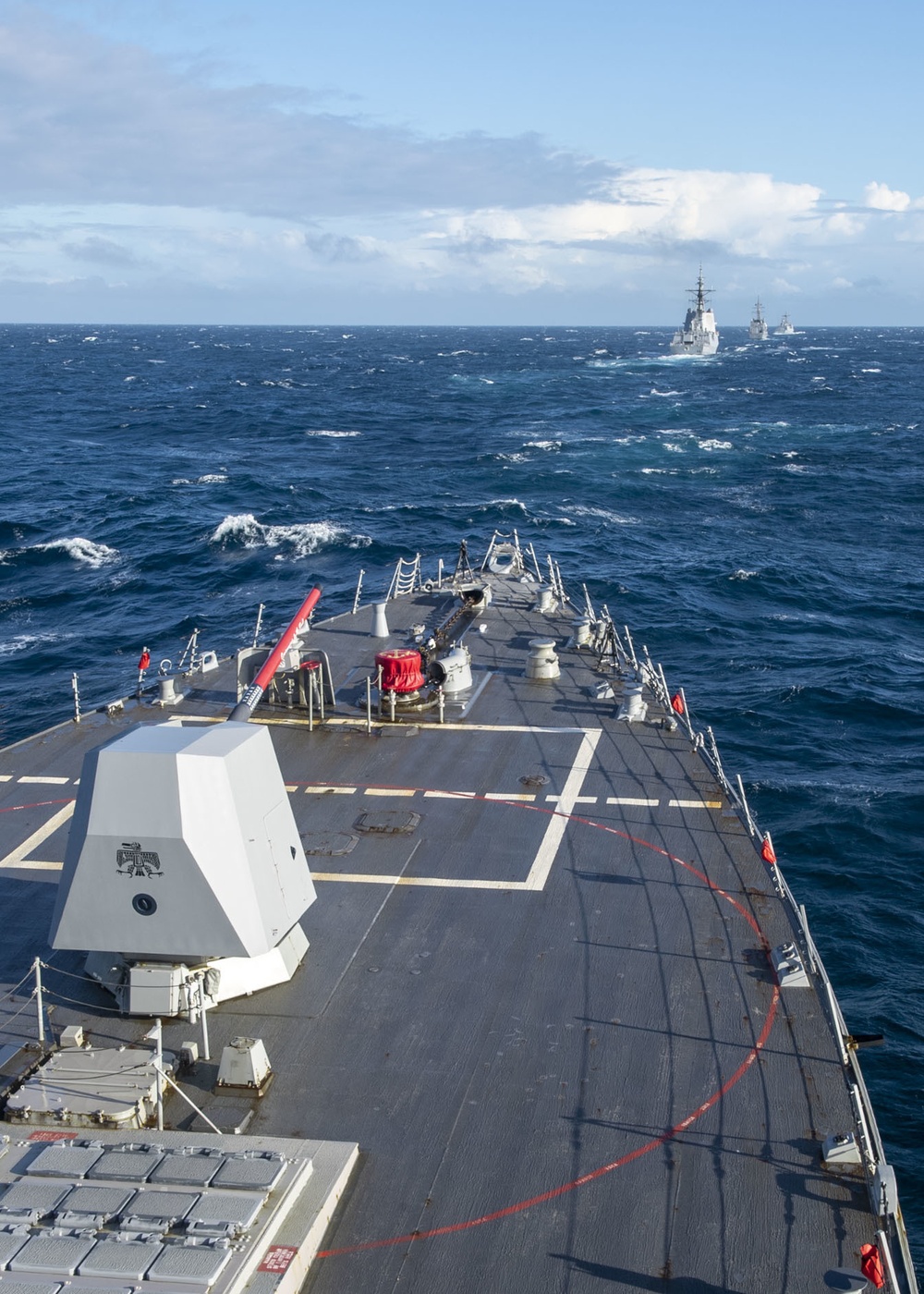 USS Rafael Peralta (DDG 115) sails in formation with Royal Australian Navy HMAS Brisbane (DDG 41), Republic of Korea Navy Chungmugong ROKS Wang Geon (DDG 978) and Japan Maritime Self Defense Force JS Makinami (DD 112)