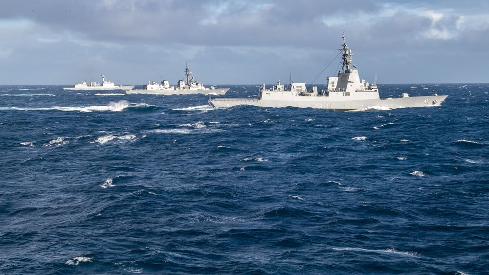 USS Rafael Peralta (DDG 115) sails in formation with Royal Australian Navy, Republic of Korea Navy and Japan Maritime Self Defense Force