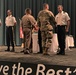 Brig. Gen. Budraitis presents coins to SLC Distinguished Honor Grad and Commandant's List