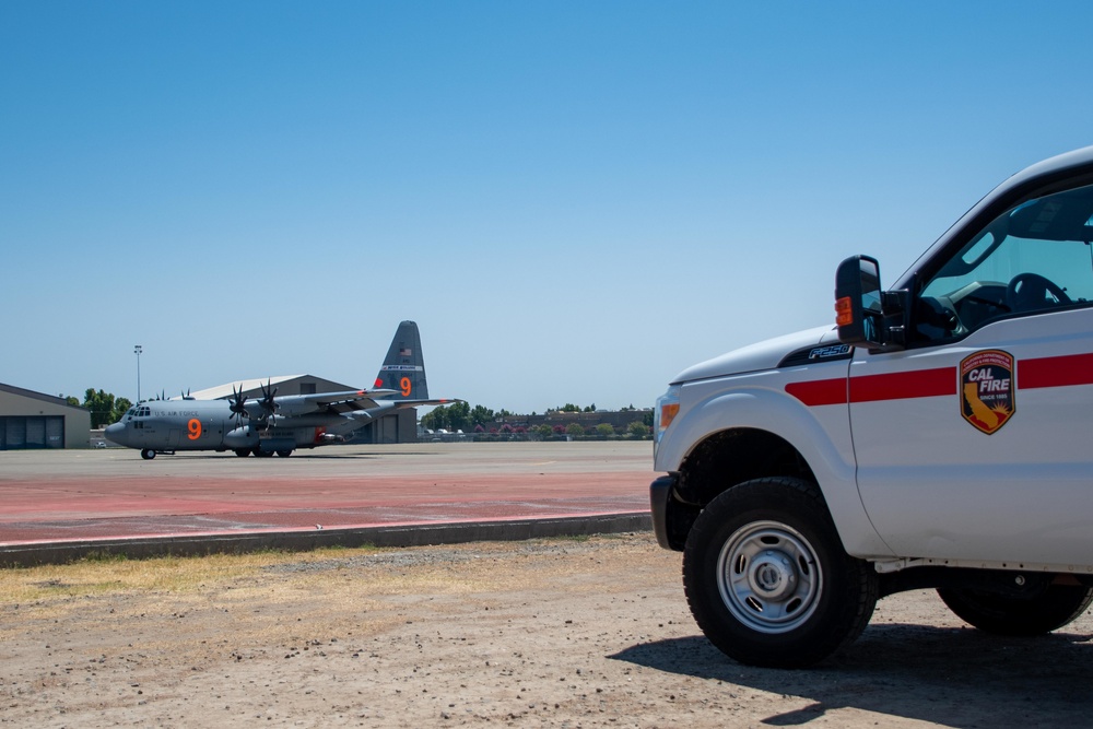 Air National Guard C-130, MAFFS 9 out of Reno, Nev. returns to McClellan Air Tanker Base, Sacramento, Calif.