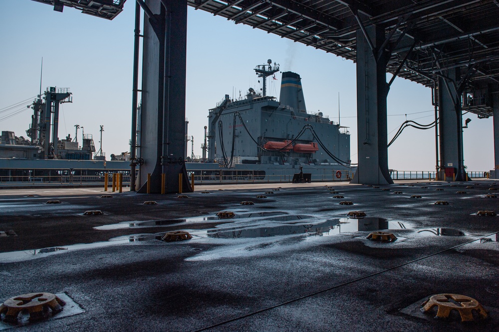 USS Lewis B. Puller Conducts Replenishment At Sea