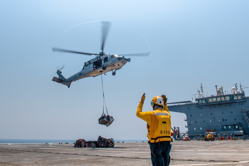 USS Lewis B. Puller Conducts Replenishment At Sea