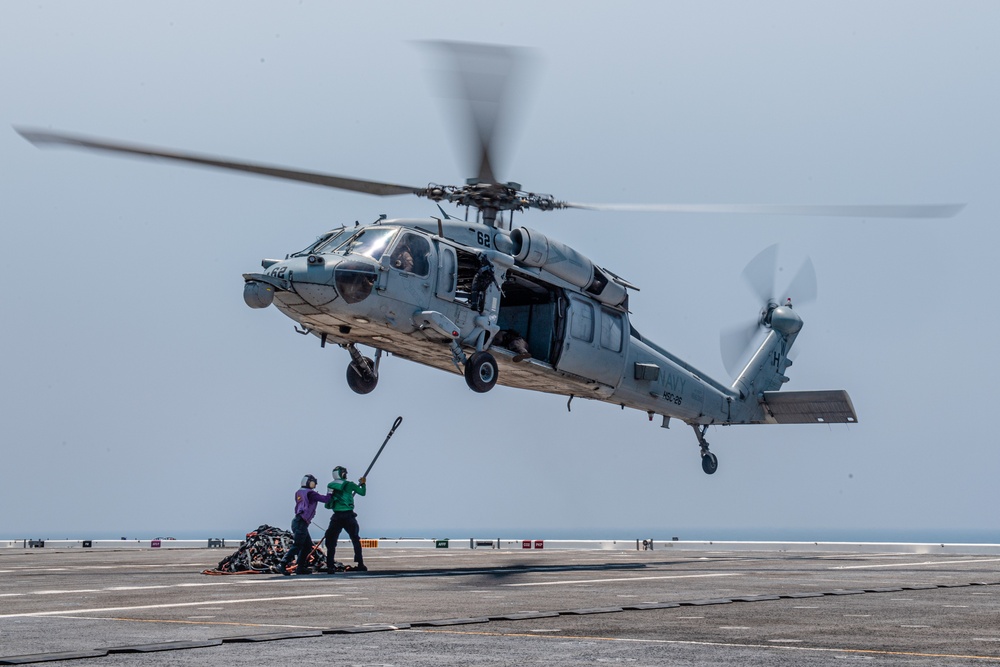 USS Lewis B. Puller Conducts Replenishment At Sea