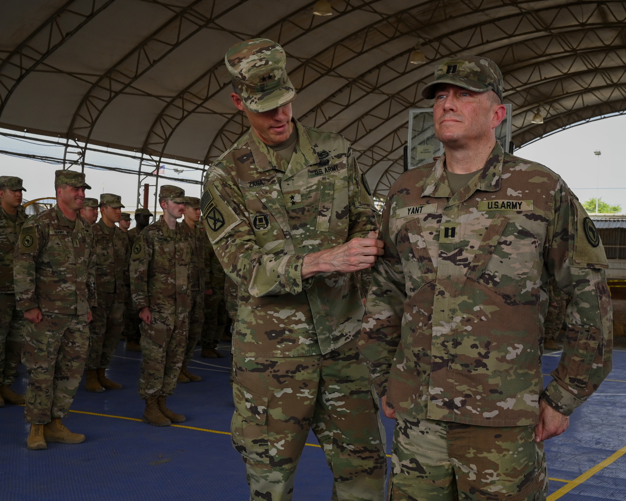 DVIDS - Images - CJTF-HOA service members receive AFRICOM combat 