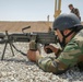 Peshmerga soldier conducts shooting training with an M249