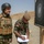 Peshmerga soldiers review target