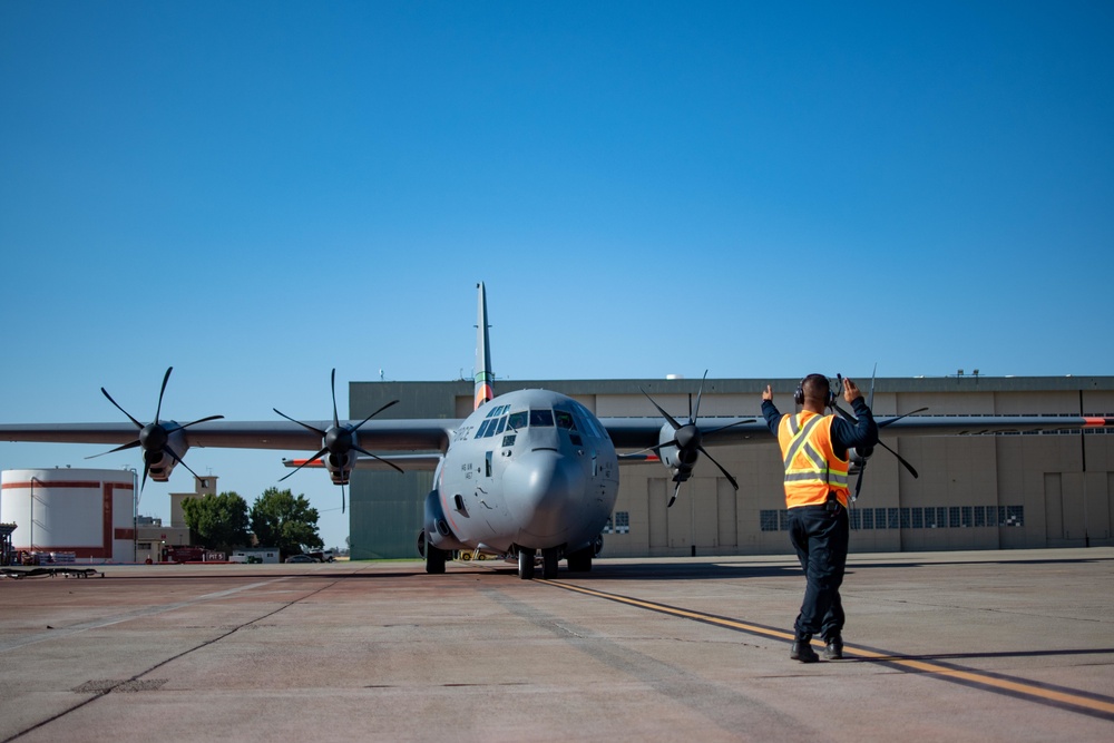 START YOUR ENGINES: A CAL FIRE employee launches an Air National Guard C-130 from McClellan Air Tanker Base, Sacramento, Calif.