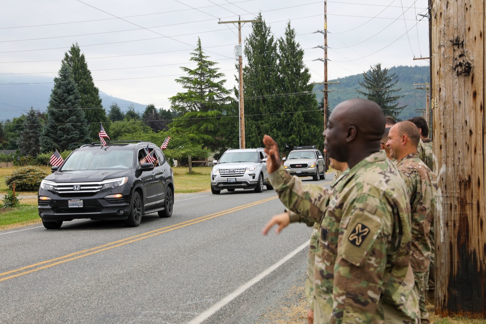 Local food bank hosts a parade for departing National Guard members