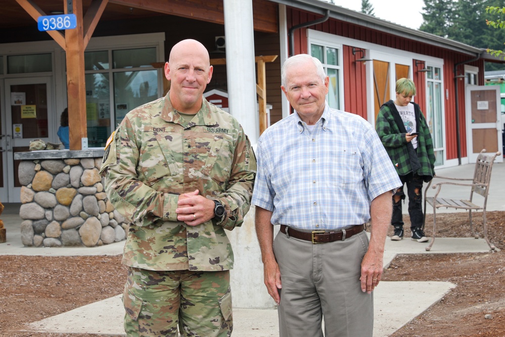 Brig. Gen. Daniel Dent poses with former Defense Secretary Robert Gates