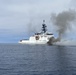 Coast Guard Cutter Munro crewmembers work to extinguish a vessel fire off the San Diego coast