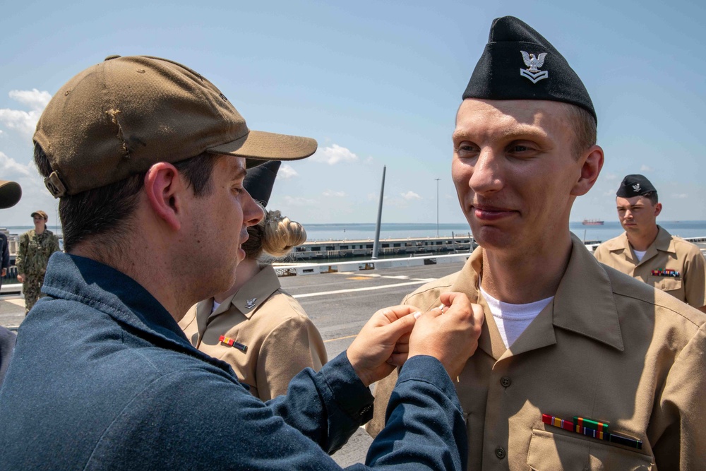 USS Arlington Sailors advance in rank