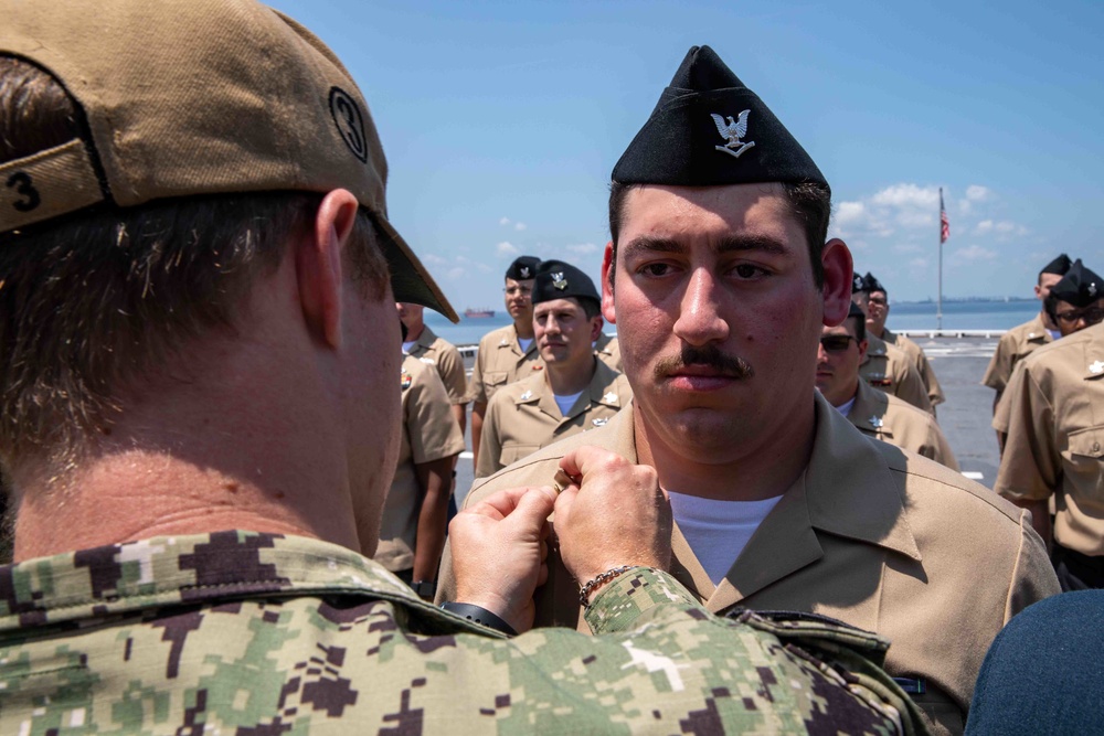 USS Arlington Sailors advance in rank