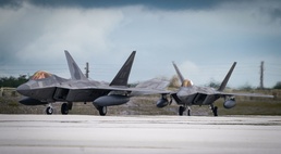 Alaska F-22s arrive on Guam for Pacific Iron 21
