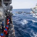 Royal Fleet Auxiliary replenishment tanker refuels United States Guided Missile Cruiser CG 67