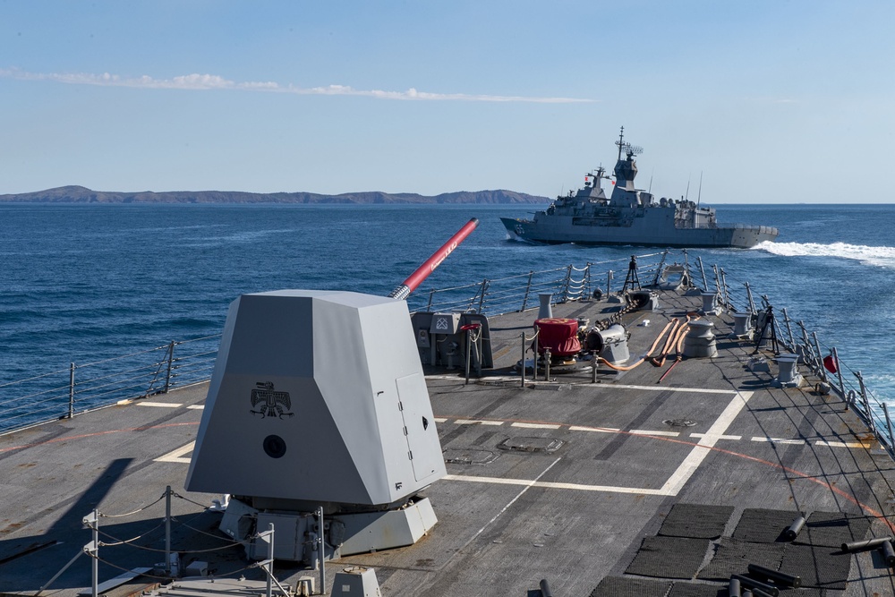 USS Rafael Peralta (DDG 115) sails with HMAS Ballarat (FFH 155) for Naval Surface Fire Support during Exercise Talisman Sabre 21